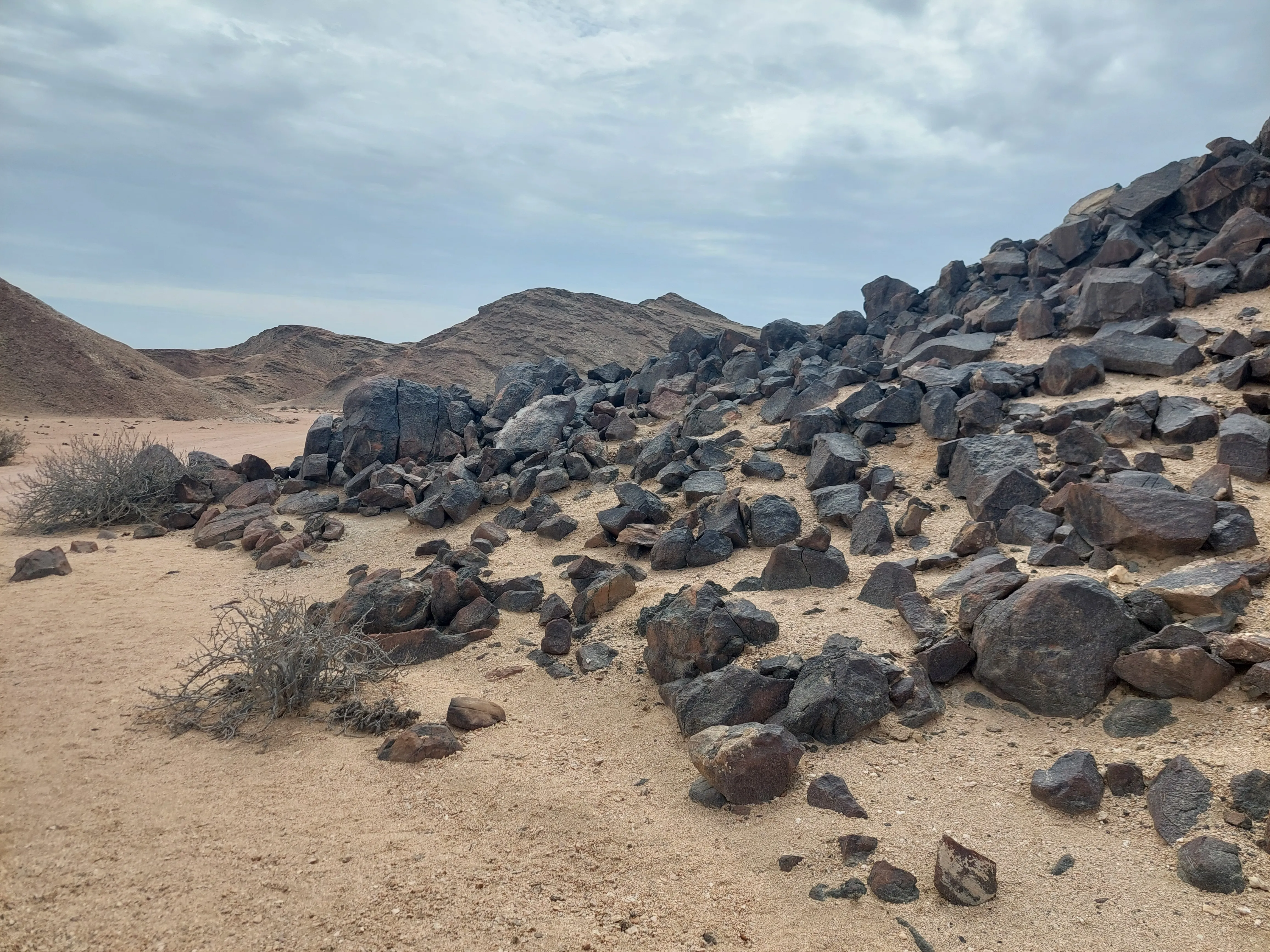Visitors enjoying guided Moon Valley desert dune tour in Namibia - Dominus Dune Tours