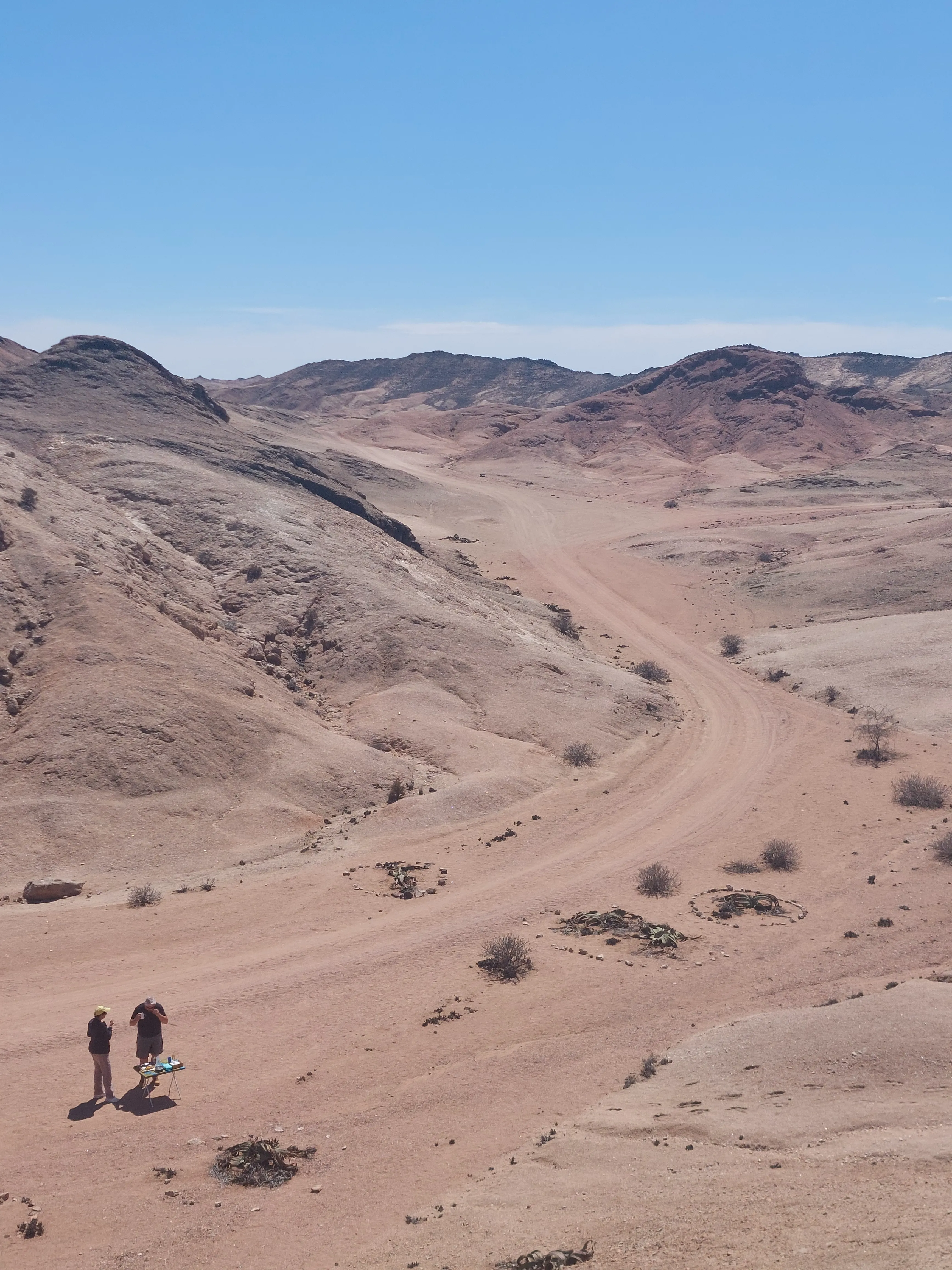 Guided tour visitors exploring Moon Valley desert dunes Namibia - Dominus Dune Tours