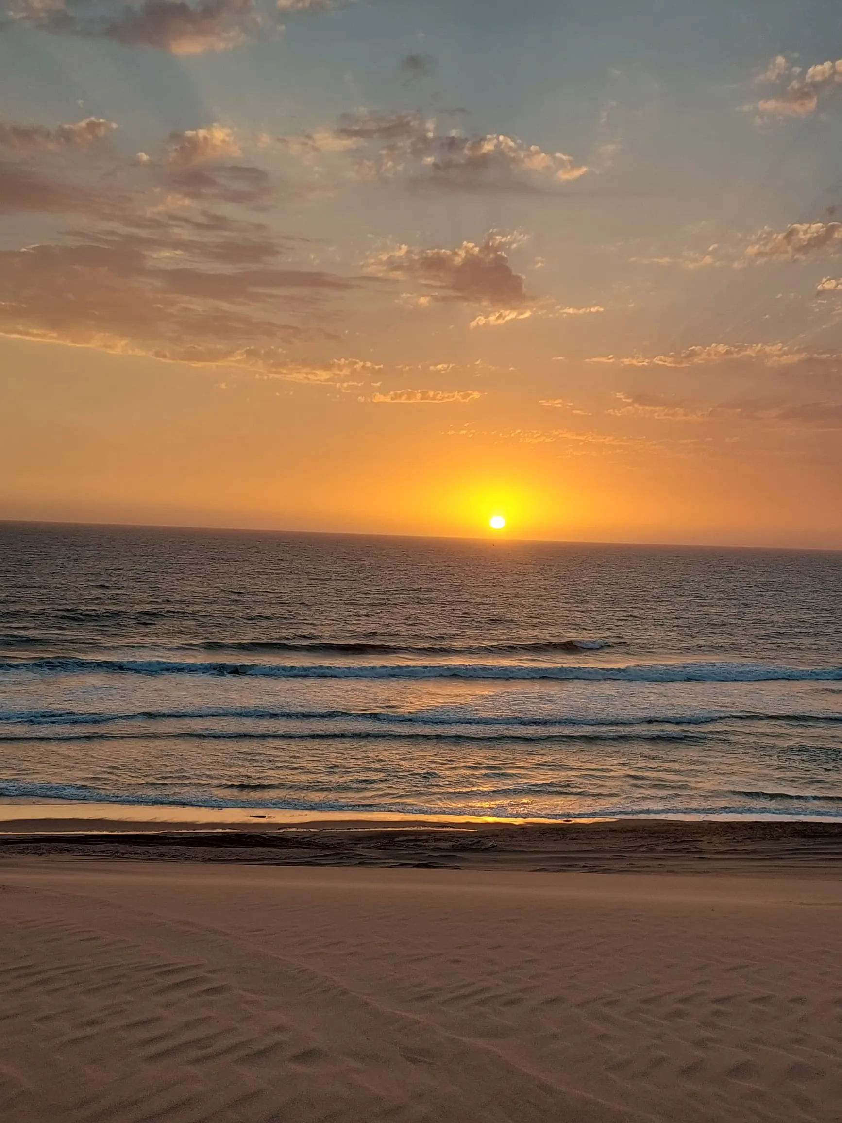 Dramatic contrast of desert and ocean at Sandwich Harbour, Namibia