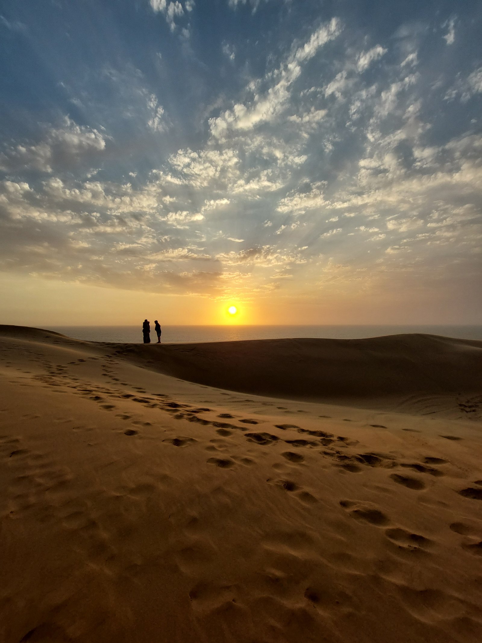 4x4 vehicle navigating challenging terrain at Sandwich Harbour tour